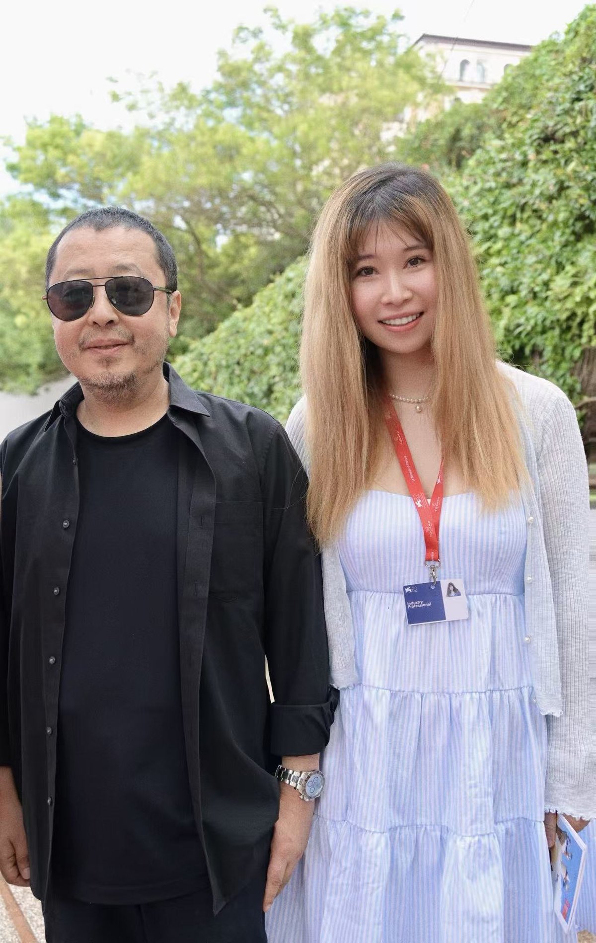 Katherine at Venice Film Festival 2025 with director Jia Zhangke